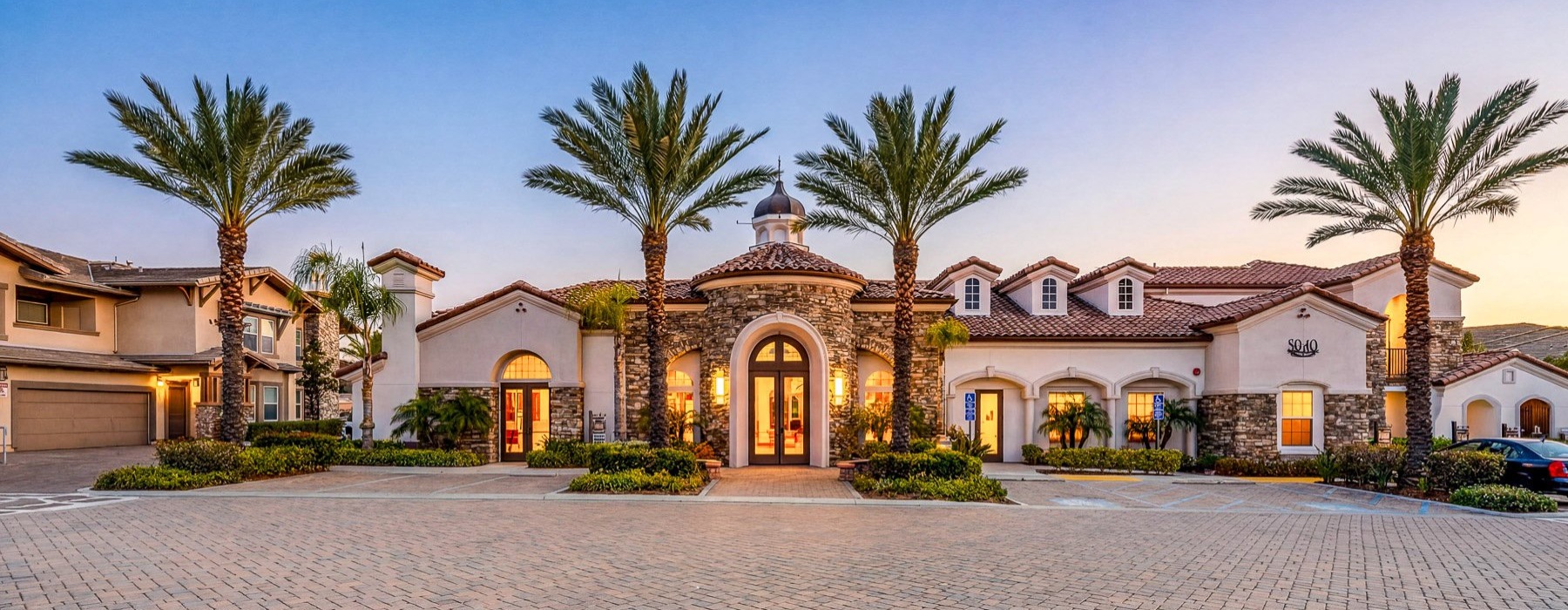 a building with palm trees