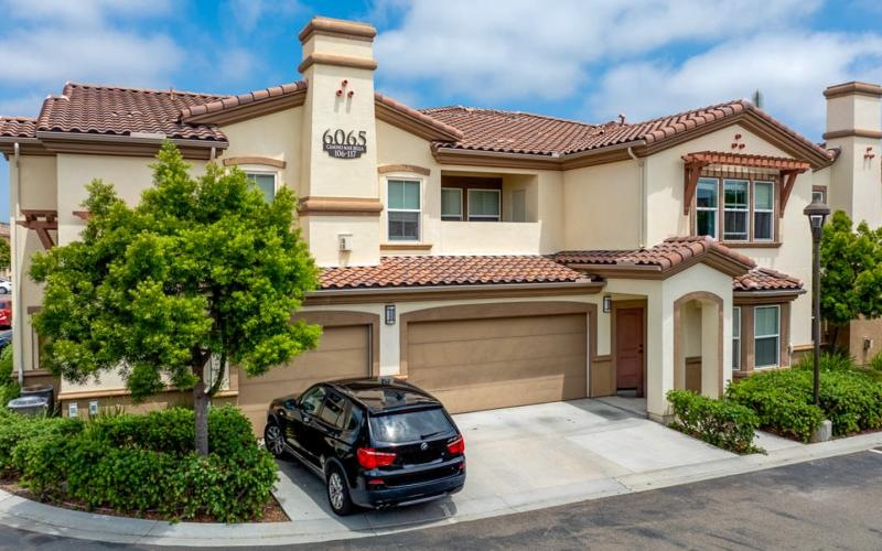 a car parked in front of a home